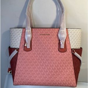 Make:Michael Kors Brand New without tags multi color handbag